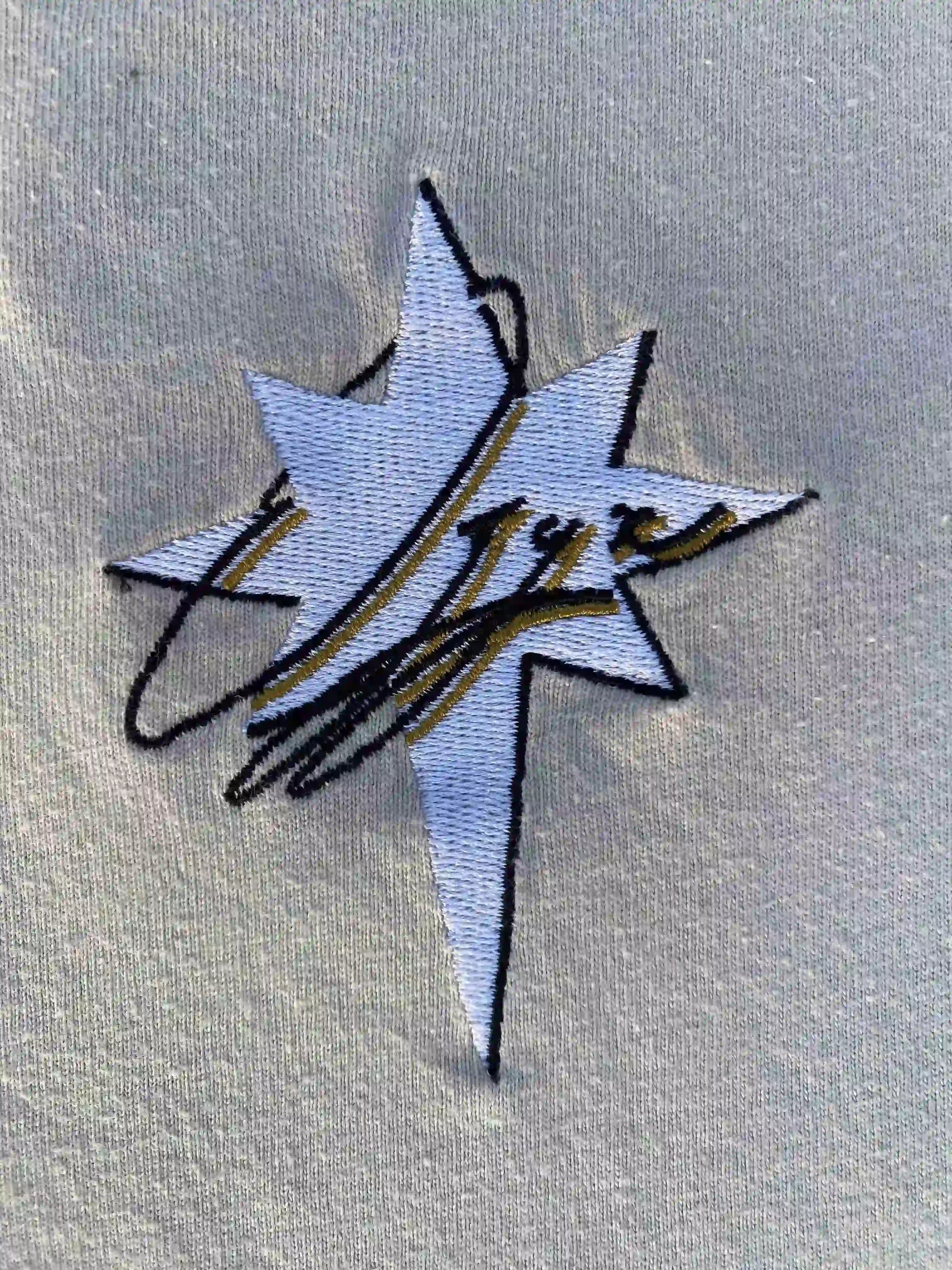 zoom-broderie-etoile-blanche-ozyx-t-shirt-worldwide-finition-premium-coton-beige